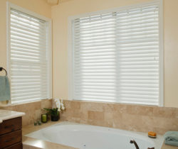 Faux wood custom blinds provide great privacy for this bathroom