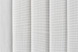 White vertical sliding panel custom blinds by Oregon Blinds