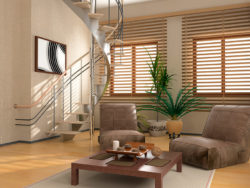 Wood window blinds by Oregon Blinds accent this modern living space with spiral staircase